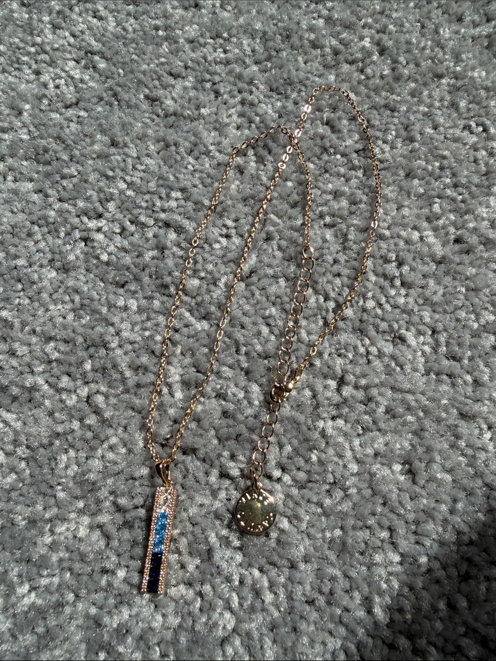Vince Camuto Gold Bar necklace with blue stones